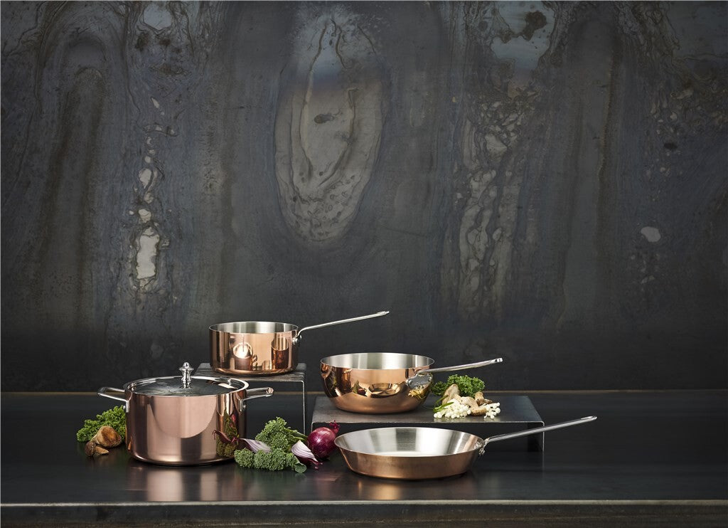 SCANPAN Maitre D' Induction collection with sauteuse on a dark kitchen counter