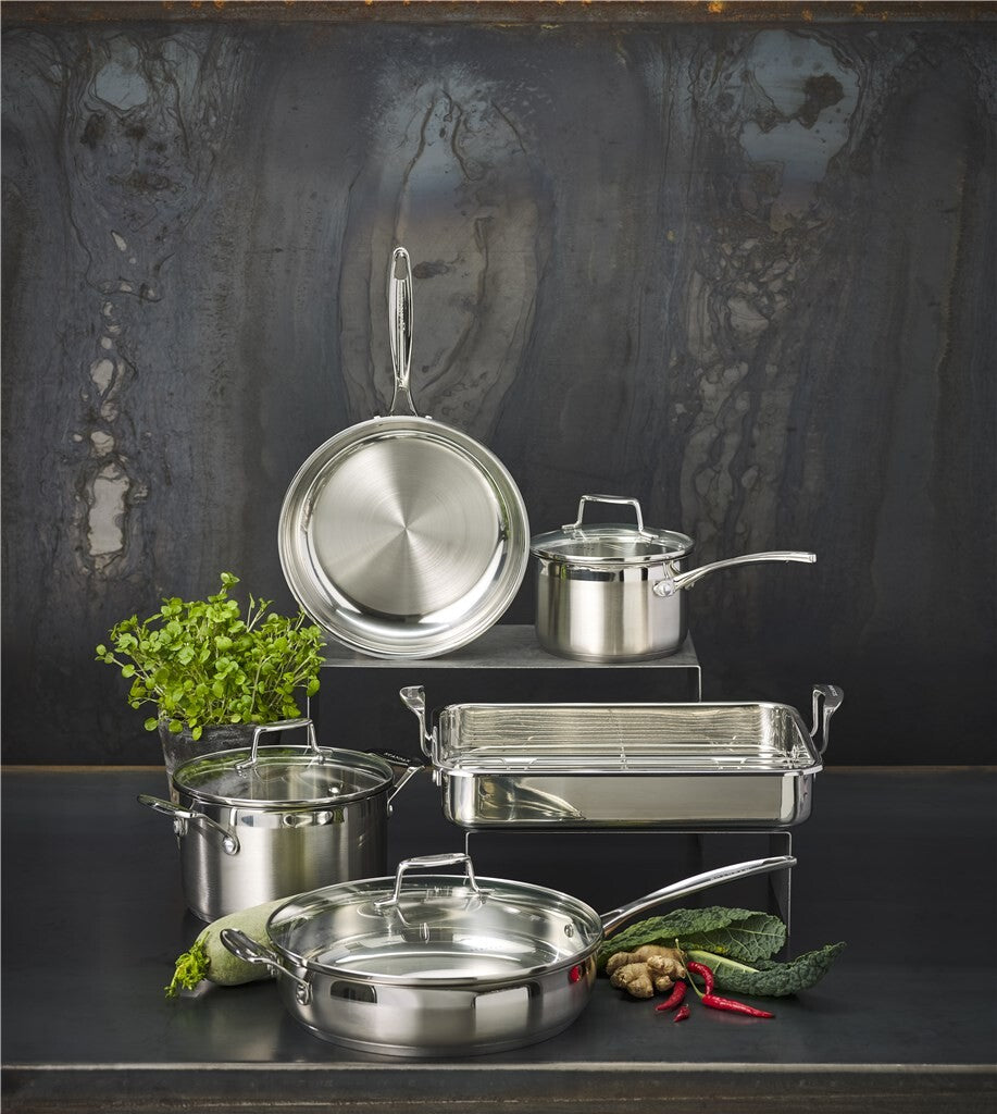 Impact range – arranged cookware in a dark kitchen setting