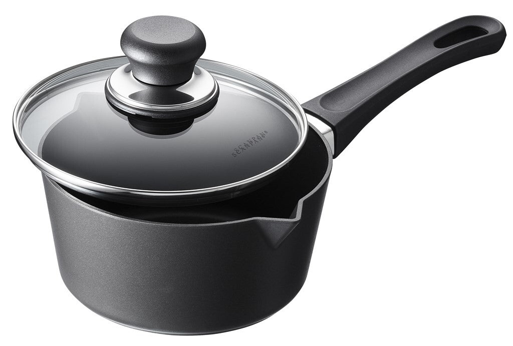 SCANPAN Classic 16 cm saucepan with glass lid viewed at an angle