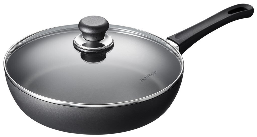 SCANPAN Classic 28 cm sauté pan with glass lid viewed at an angle