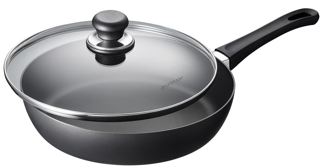 SCANPAN Classic 28 cm sauté pan with glass lid viewed at an angle