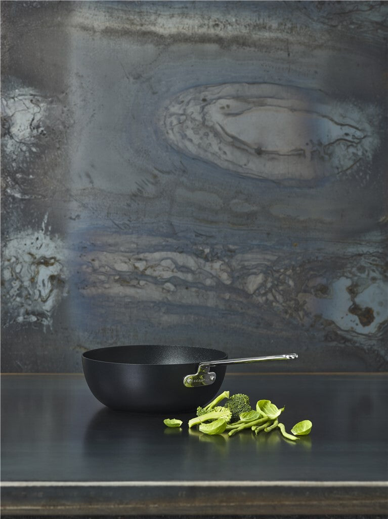 Food being prepared in the TechnIQ Bistro sauteuse 26 cm