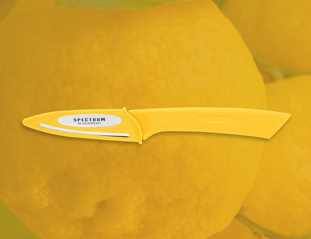 Spectrum paring knife 8 cm in Sunstruck shown in use