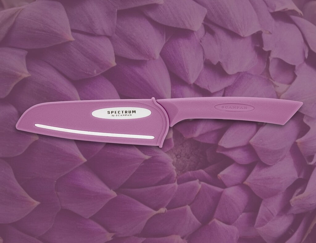 Spectrum santoku knife in Dusty Lavender shown in use