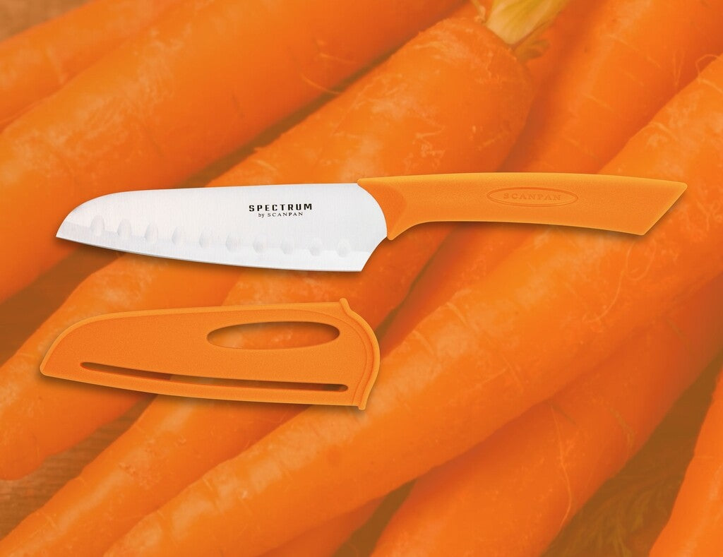 Spectrum santoku knife in Carrot Curl on a white background