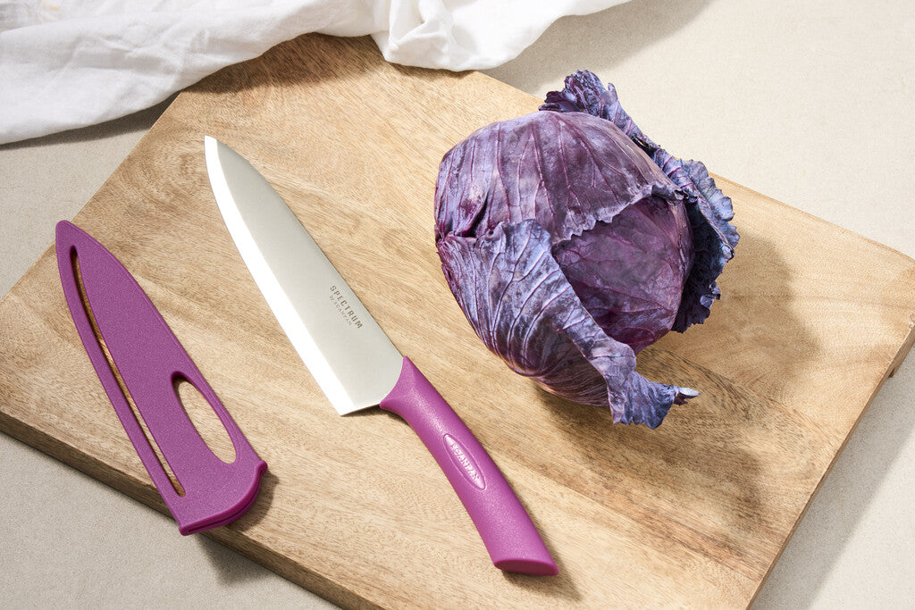 Spectrum chef's knife in Dusty Lavender shown in use