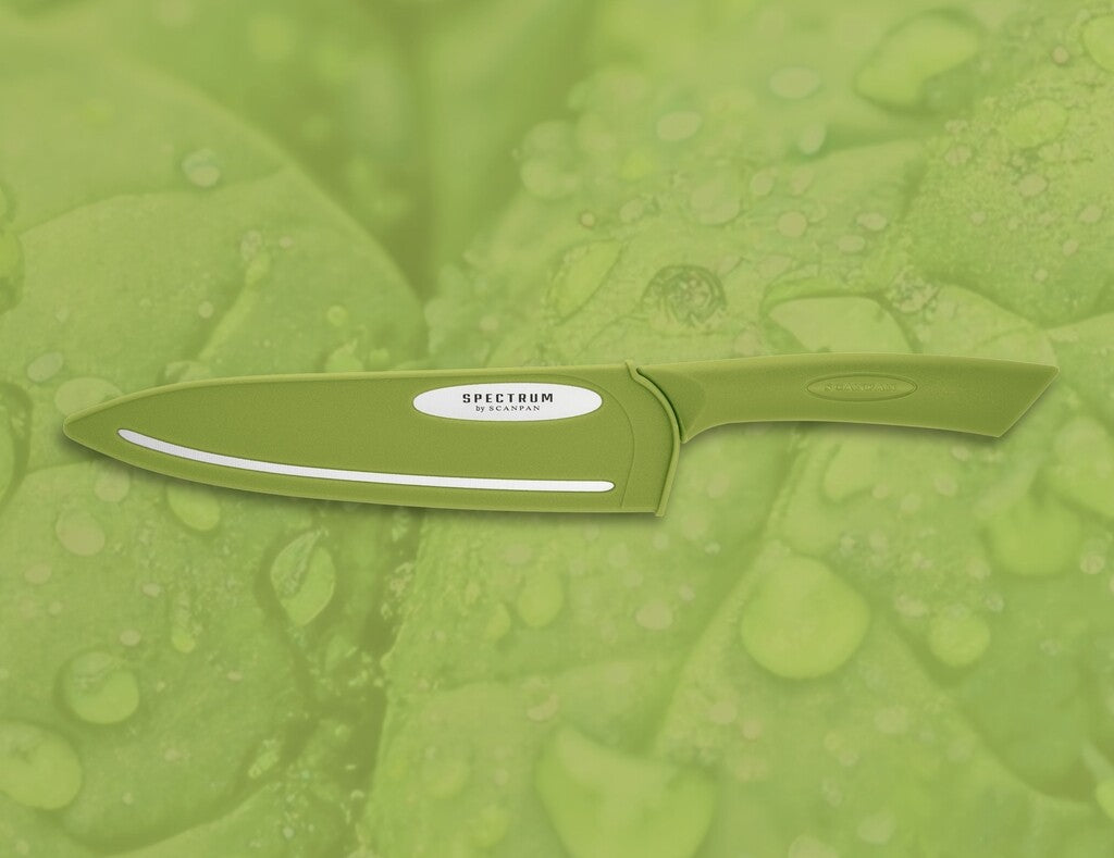 Spectrum chef's knife in Spinach Green shown in use