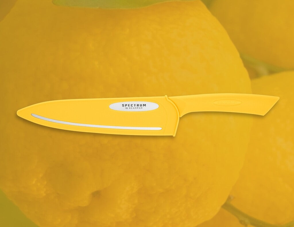 Spectrum chef's knife in Sunstruck shown in use