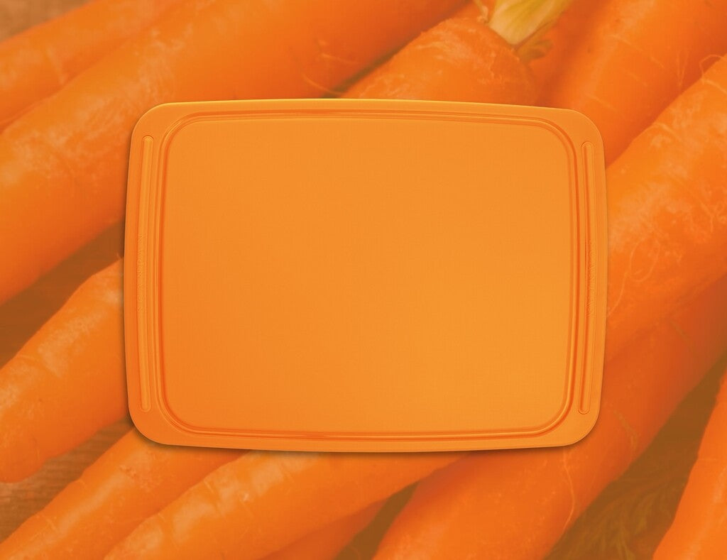 Spectrum snijplank 41 × 30 cm in de kleur Carrot Curl op een witte achtergrond