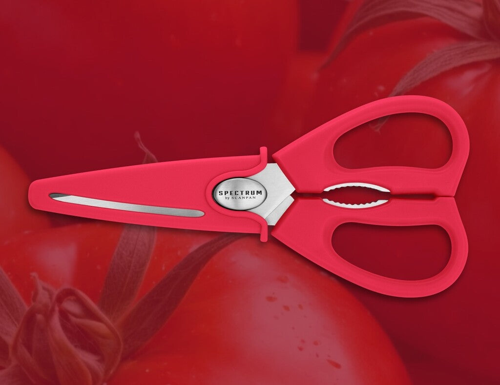Spectrum kitchen scissors in Red shown in use
