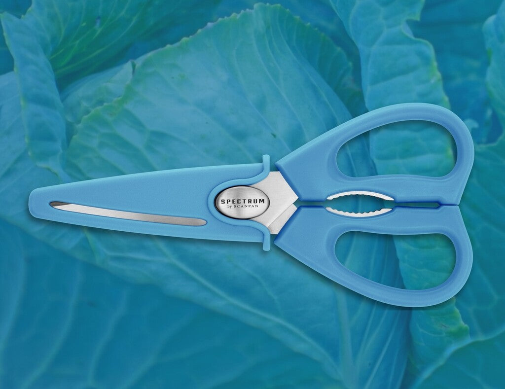 Spectrum kitchen scissors in Silver Lake Blue shown in use