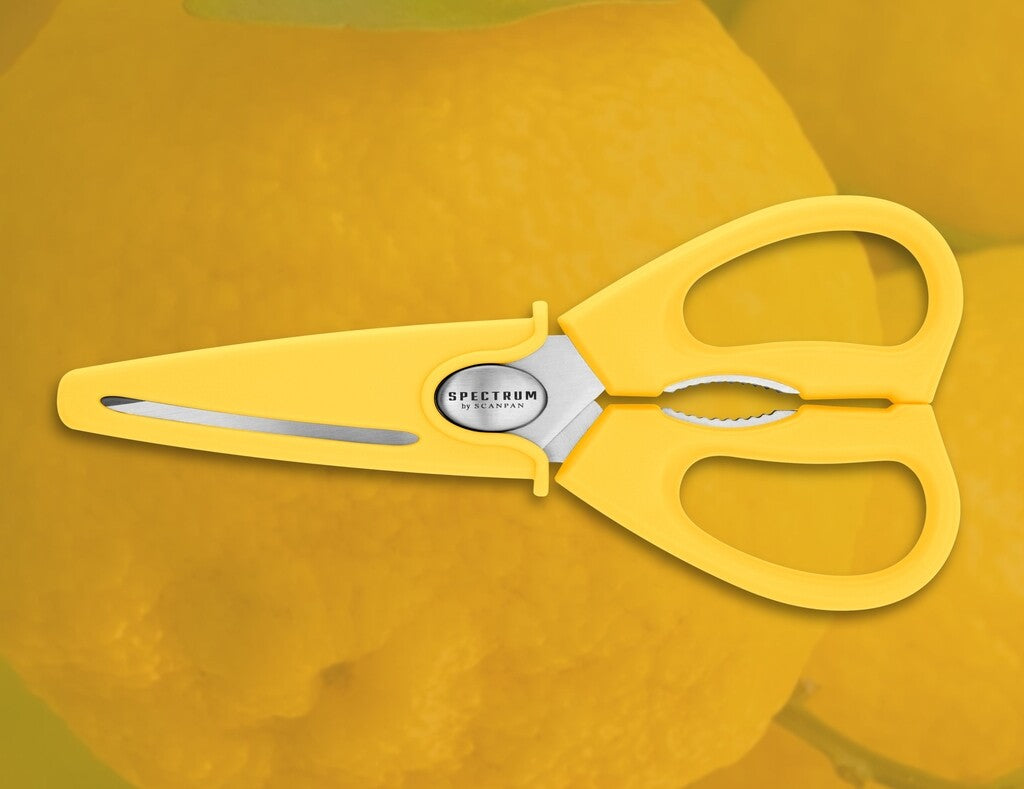 Spectrum kitchen scissors in Sunstruck shown in use